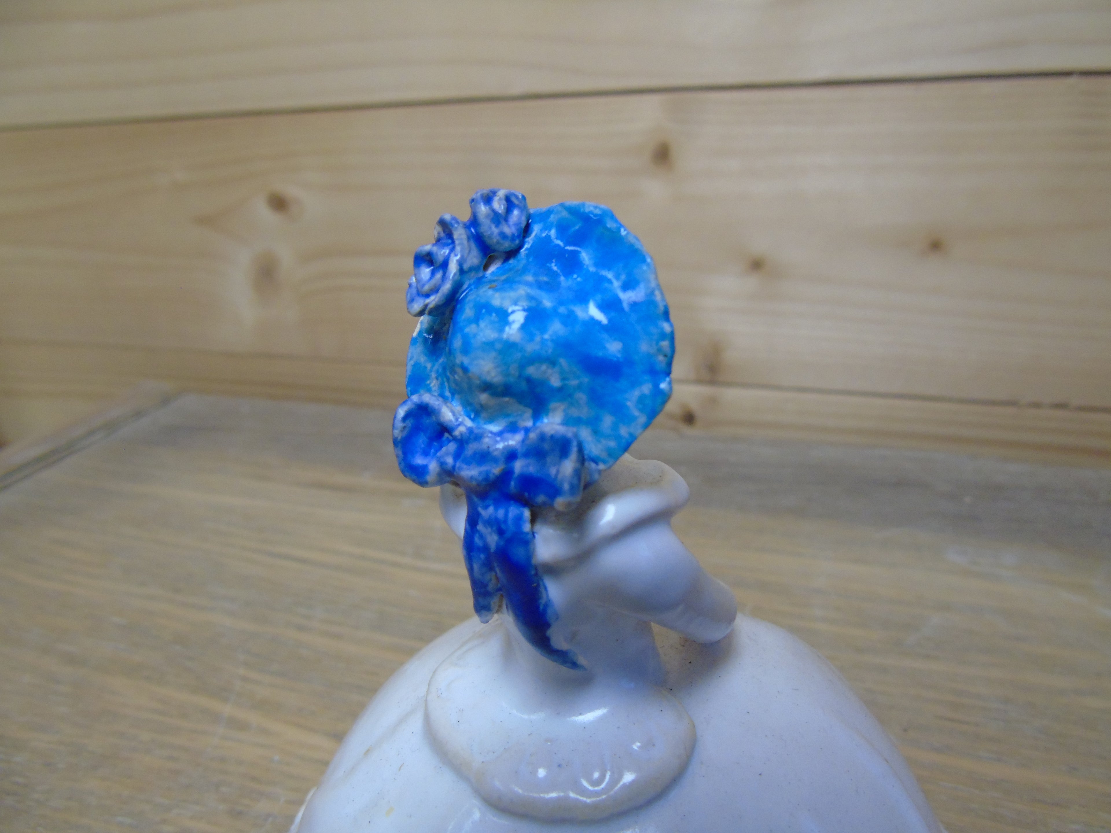 Dame met blauwe hoed