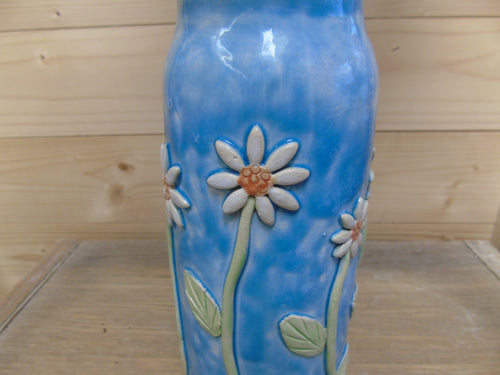 Blauwe vaas met bloemetjes