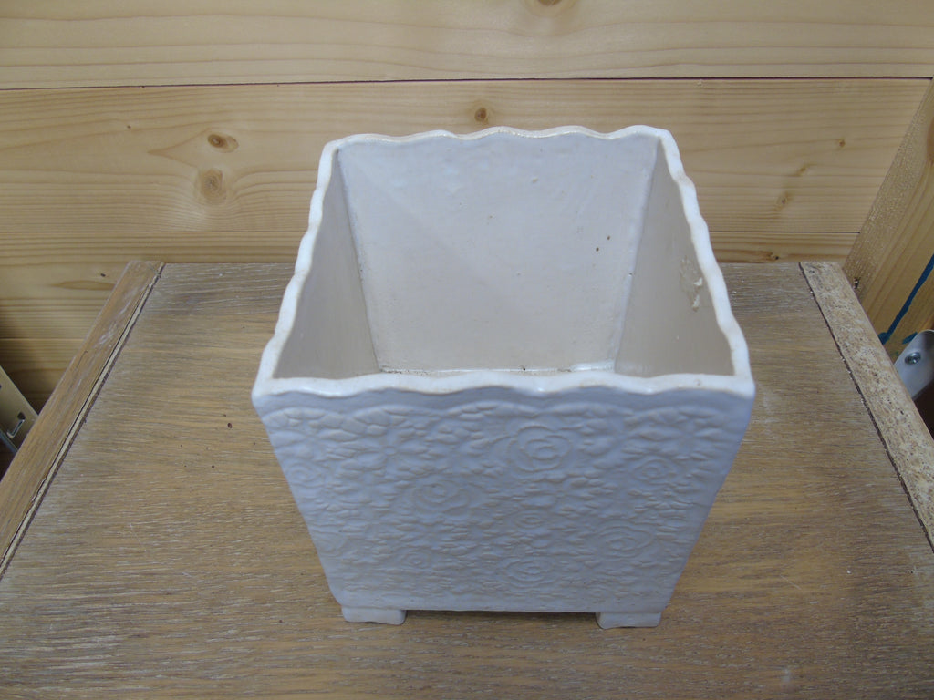 Kleine bloempot op pootjes