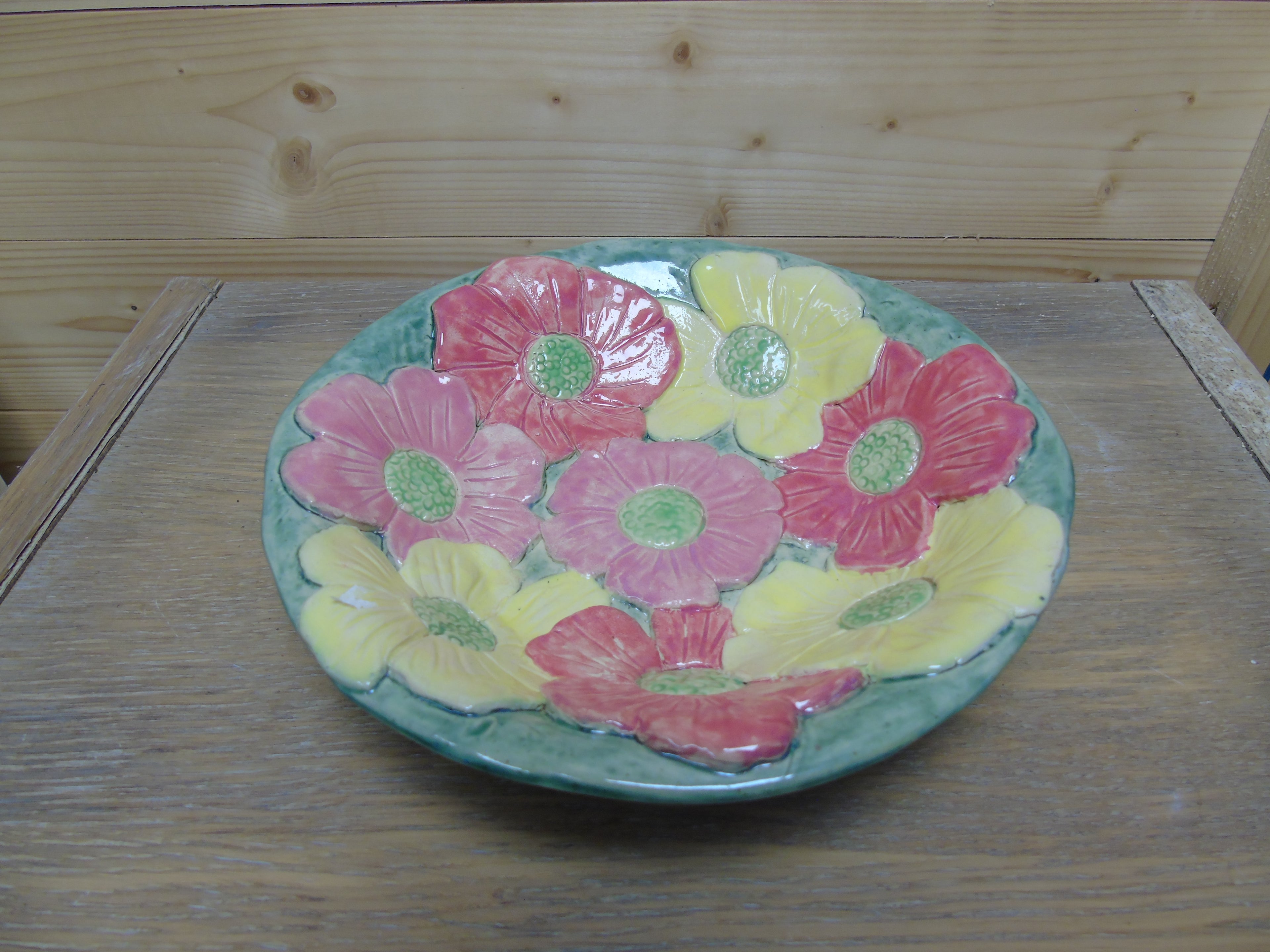 Groen bord met bloemen